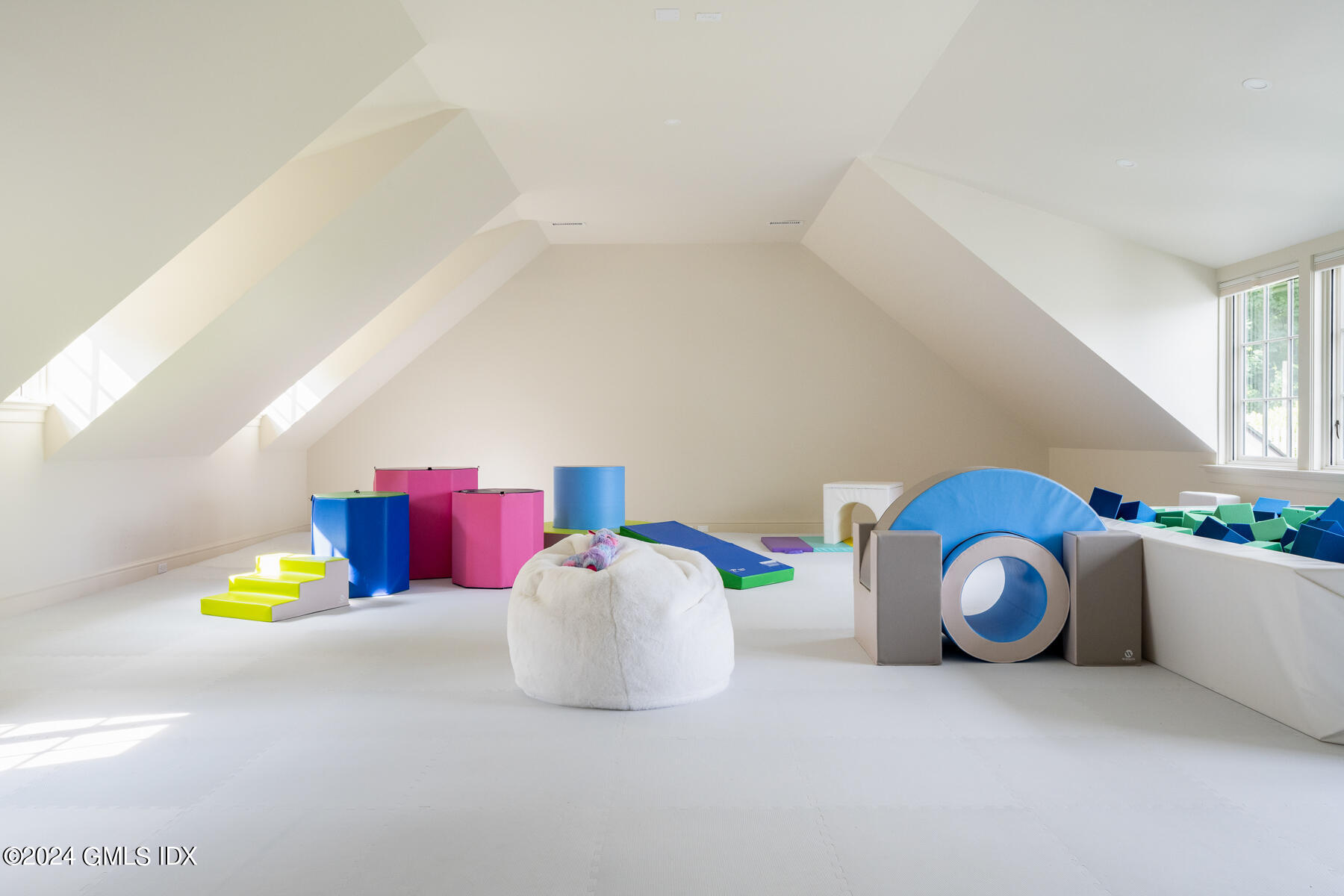 313 Stanwich Road Greenwich, CT 06830 - Photo 25 of 42 a bathroom with a sink and a mirror