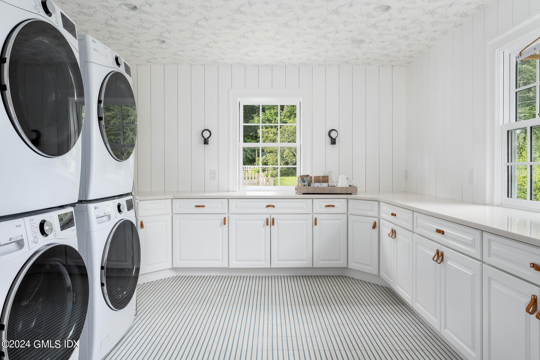 313 Stanwich Road Greenwich, CT 06830 - Photo 26 of 42 a utility room with dryer and washer