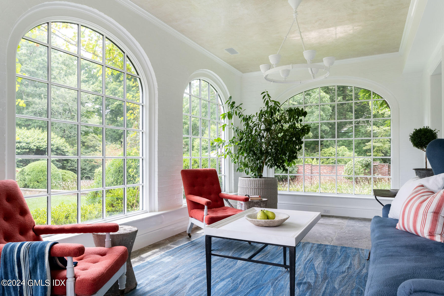 313 Stanwich Road Greenwich, CT 06830 - Photo 5 of 42 a living room with furniture and a large window