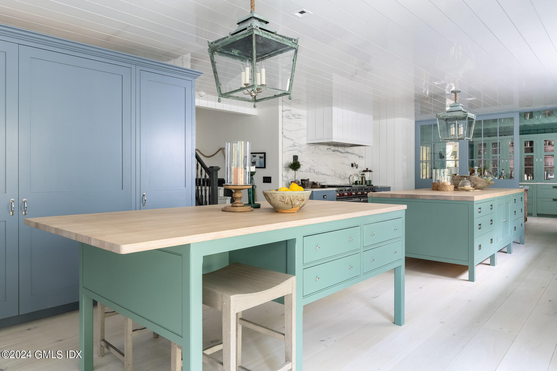 313 Stanwich Road Greenwich, CT 06830 - Photo 8 of 42 a kitchen with a table and chairs in it