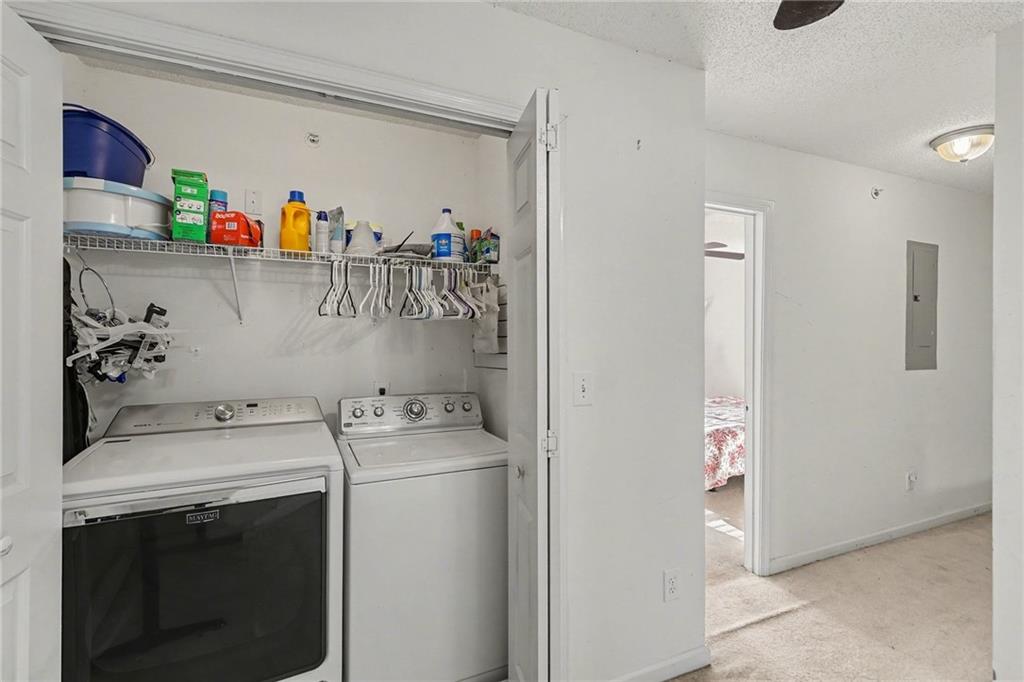 123 Chastain Circle Newnan, GA 30263 - Photo 27 of 27 a utility room with dryer and washer