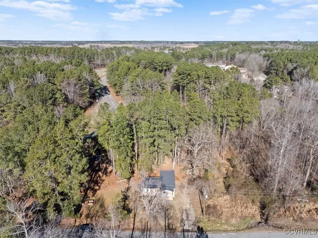 a view of a lake with a yard