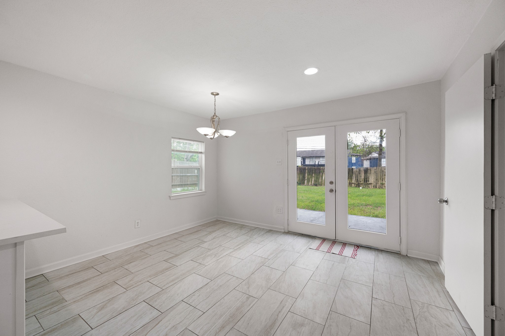 1426 Shawnee Street Houston, TX 77034 - Photo 18 of 34 Spacious dining area is a great space for large furniture and gatherings. Endless possibilities for this space.