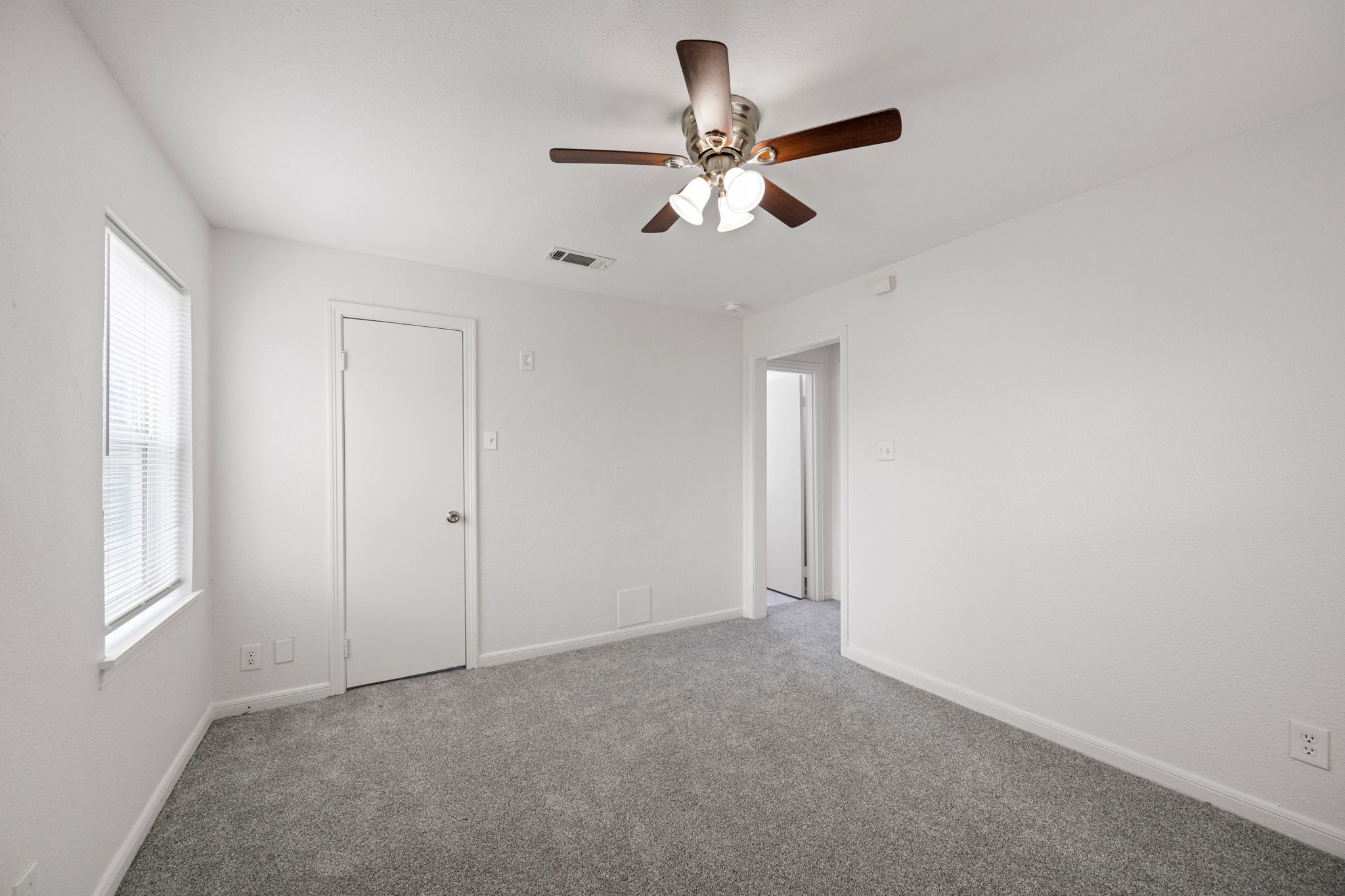 1426 Shawnee Street Houston, TX 77034 - Photo 19 of 28 Another view of the primary bedroom, spacious enough for large furniture. Primary suite features a walk-in closet.