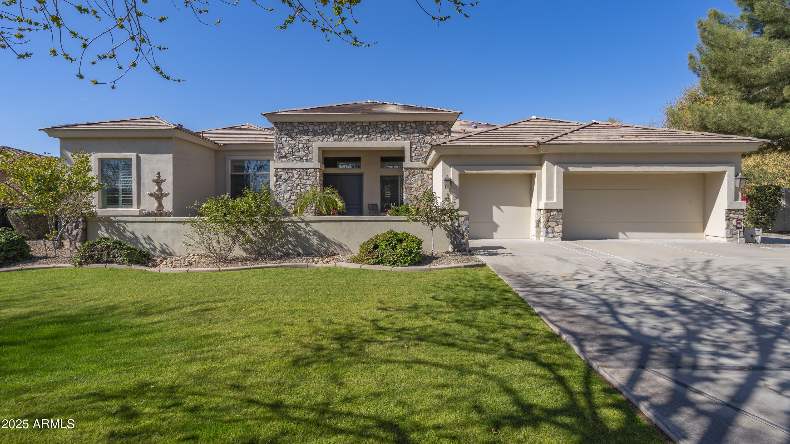 56 South Prairie Road Gilbert, AZ 85296 - Photo 1 of 59 a front view of a house with a yard
