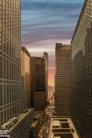 a view of a city with tall buildings