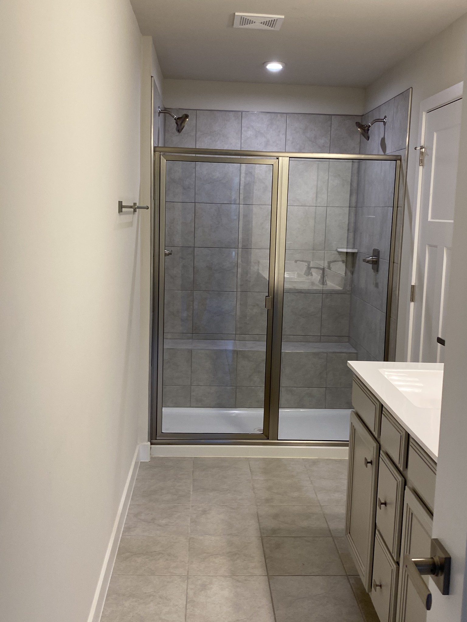 110 Keelon Gap Road, Unit 104C Spring Hill, TN 37174 - Photo 14 of 22 a bathroom with a shower and a sink