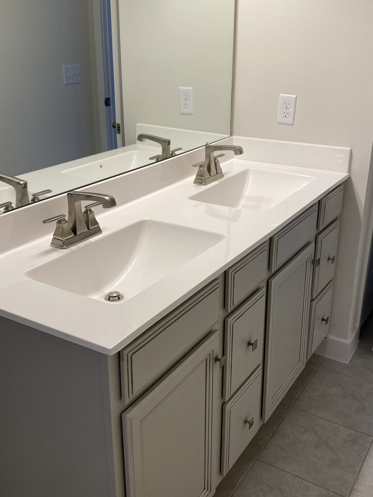 110 Keelon Gap Road, Unit 104C Spring Hill, TN 37174 - Photo 16 of 22 a bathroom with a sink and a mirror