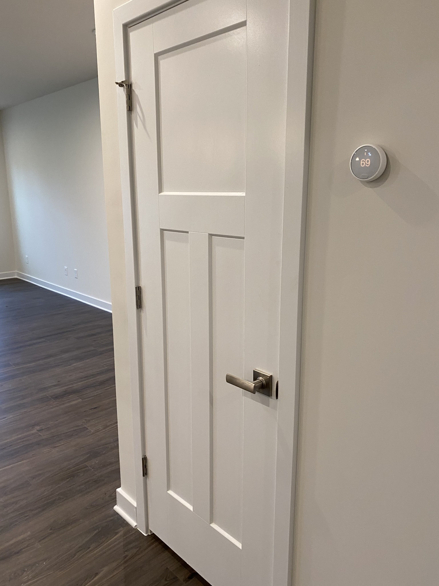 110 Keelon Gap Road, Unit 104C Spring Hill, TN 37174 - Photo 5 of 22 a view of a hallway with wooden floor and staircase