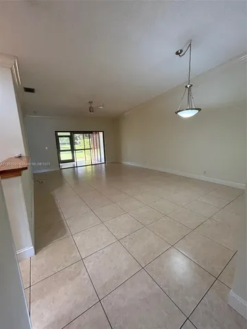 a view of a room with windows