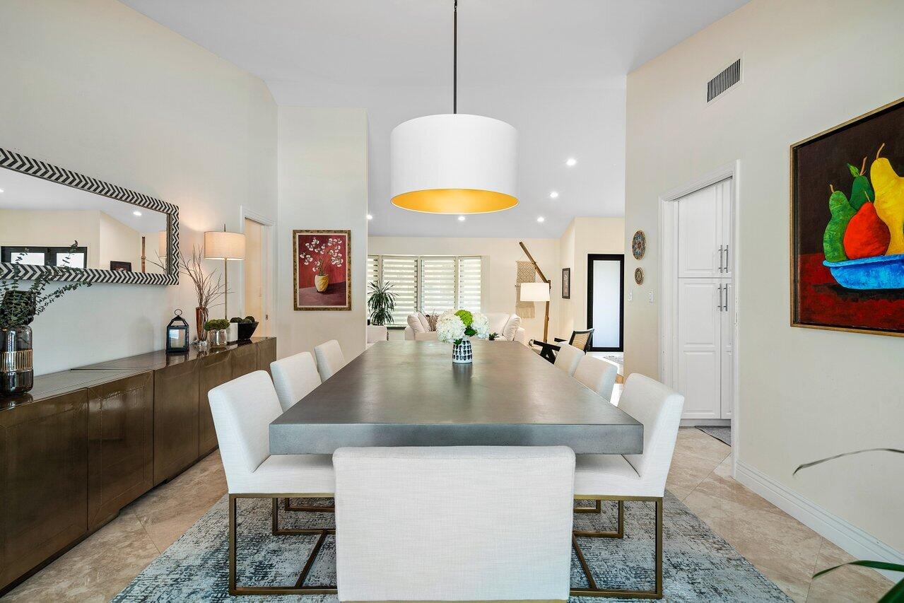 3765 Kings Way Boca Raton, FL 33434 - Photo 11 of 60 a view of a dining room with furniture and wooden floor