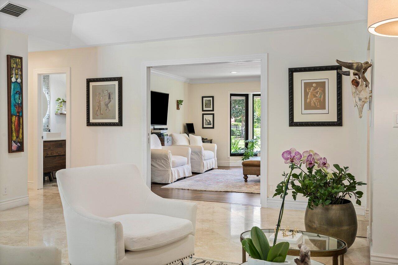3765 Kings Way Boca Raton, FL 33434 - Photo 21 of 60 a living room with furniture potted plant and a potted plant