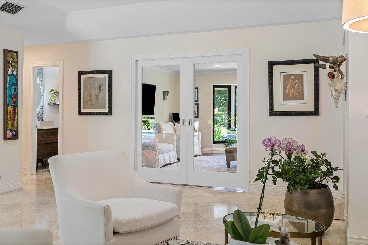 3765 Kings Way Boca Raton, FL 33434 - Photo 22 of 60 a living room with furniture flowerpot and wooden floor