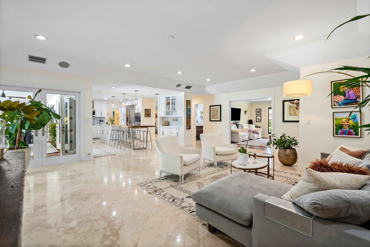 3765 Kings Way Boca Raton, FL 33434 - Photo 23 of 60 a living room with furniture and a large window