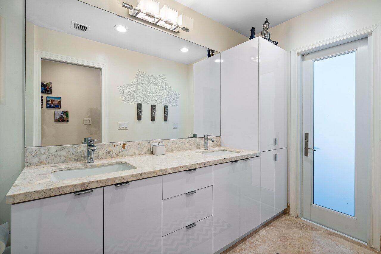 3765 Kings Way Boca Raton, FL 33434 - Photo 27 of 60 a bathroom with a granite countertop sink and a mirror