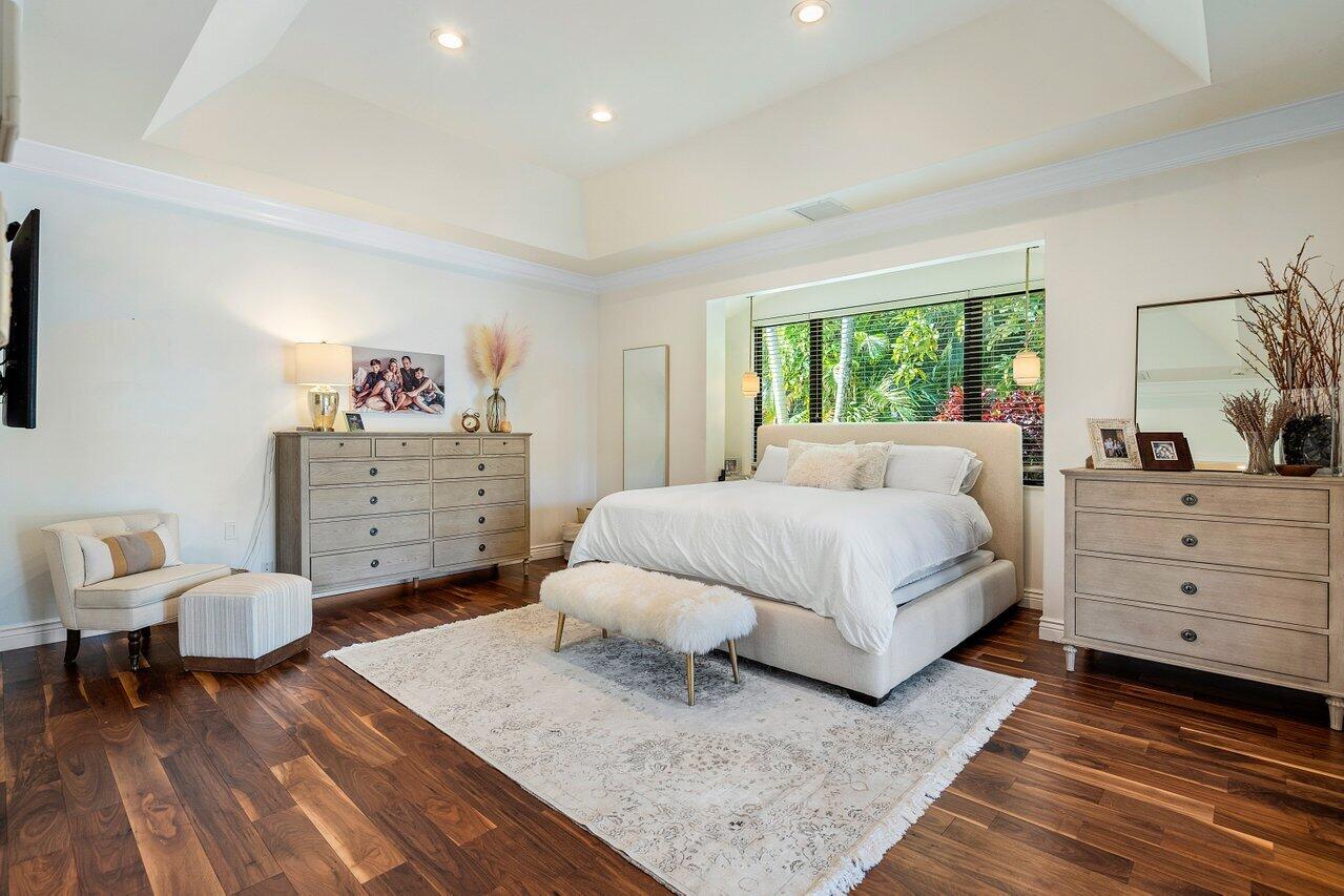 3765 Kings Way Boca Raton, FL 33434 - Photo 31 of 60 a bedroom with a bed and a dresser