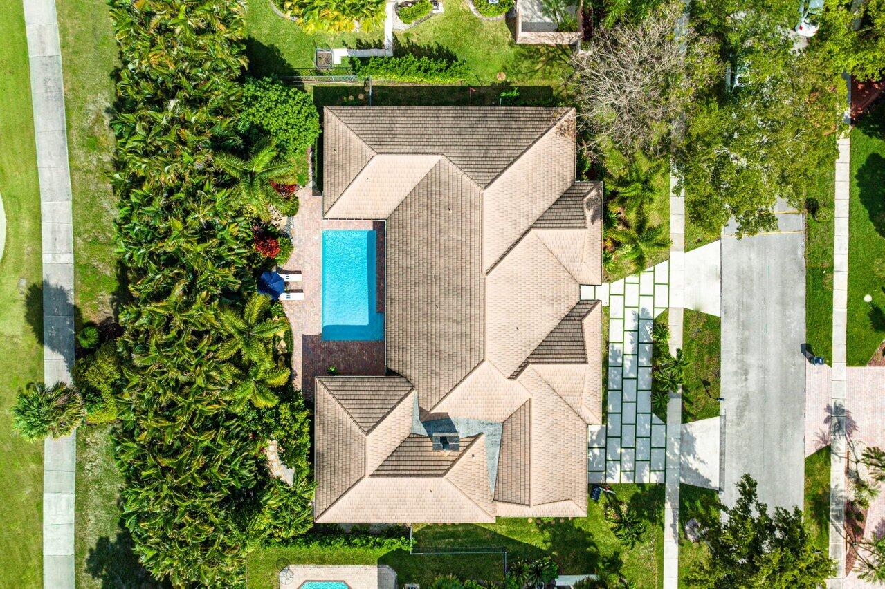 3765 Kings Way Boca Raton, FL 33434 - Photo 49 of 60 a aerial view of a house with a yard and potted plants