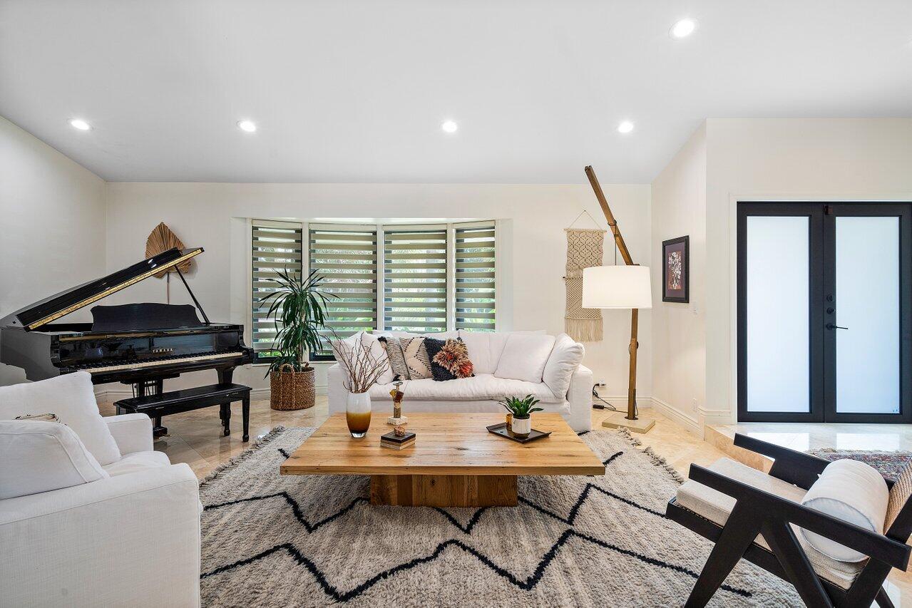 3765 Kings Way Boca Raton, FL 33434 - Photo 6 of 60 a living room with furniture and a large window