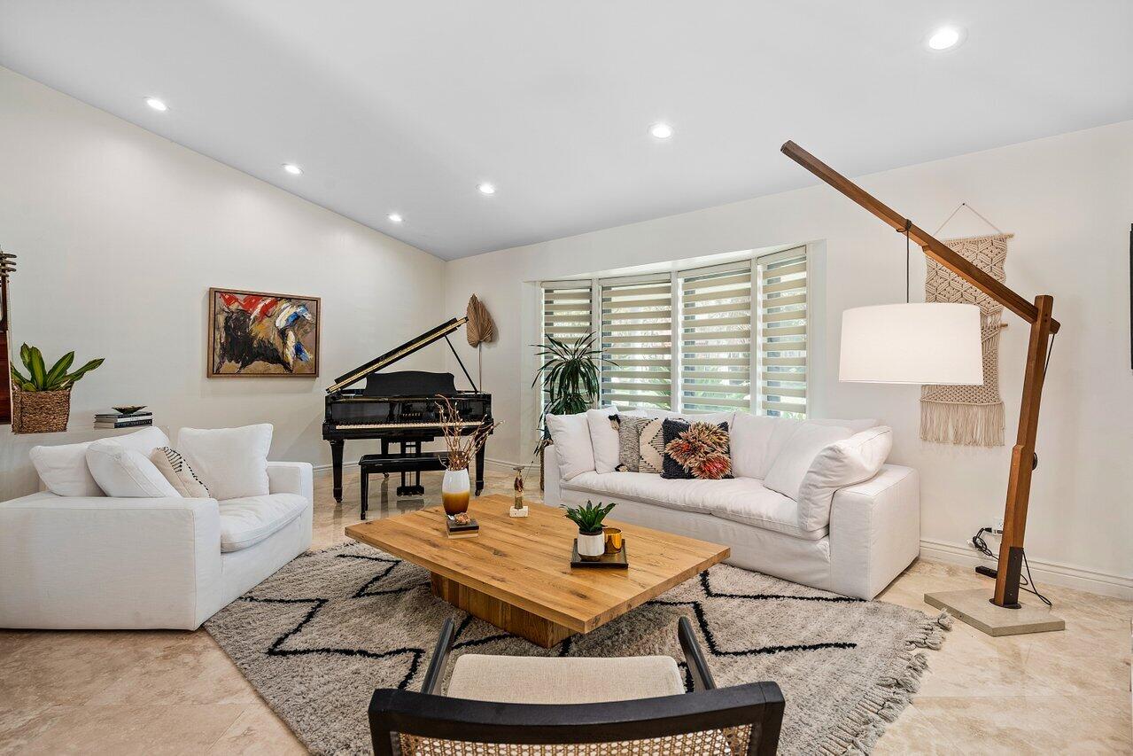 3765 Kings Way Boca Raton, FL 33434 - Photo 8 of 60 a living room with furniture and a large window