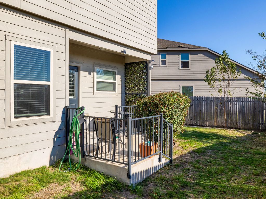464 Druse Lane Jarrell, TX 76537 - Photo 25 of 26 a view of a house with backyard and a fence