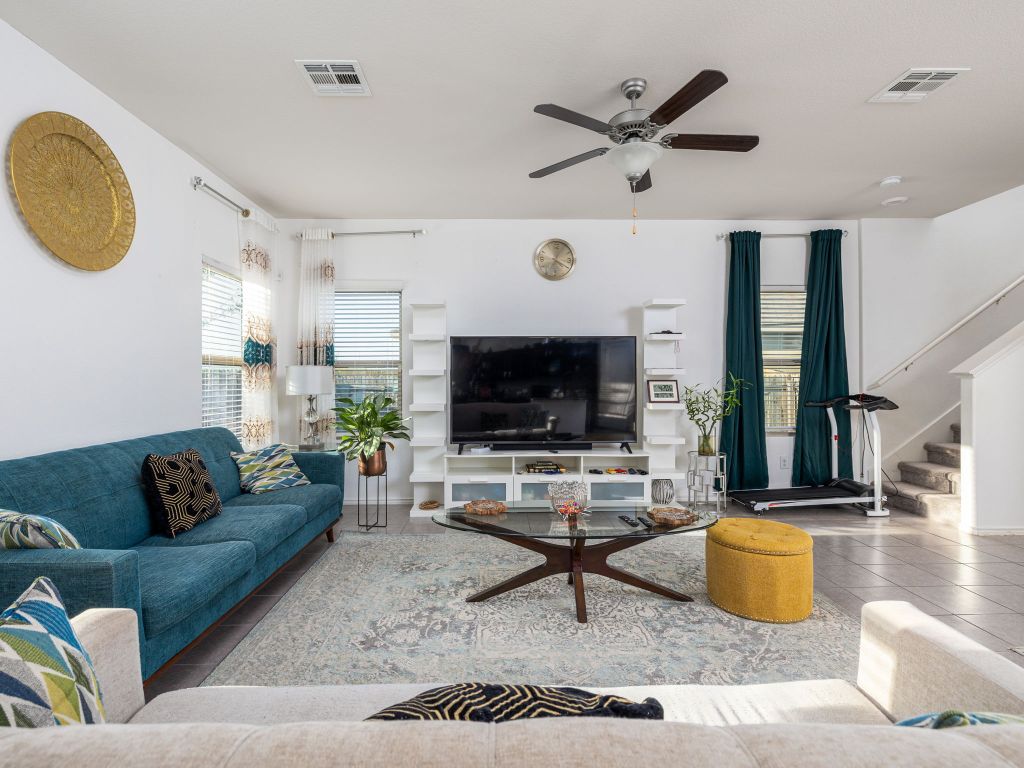 464 Druse Lane Jarrell, TX 76537 - Photo 6 of 26 a living room with furniture and a flat screen tv