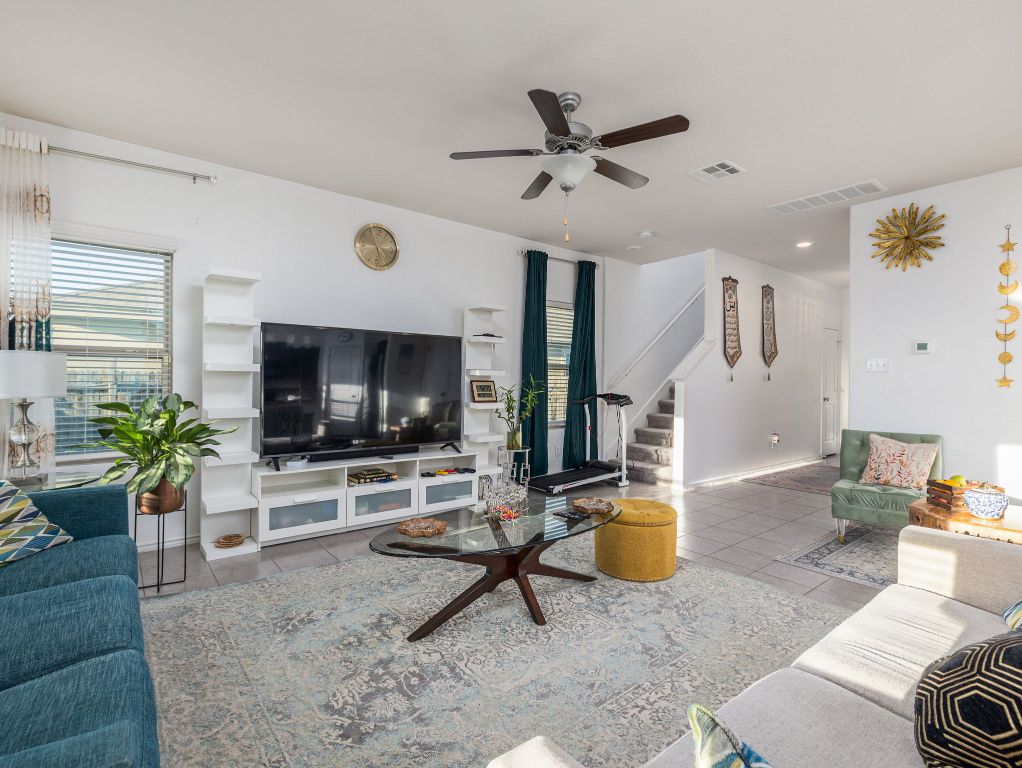 464 Druse Lane Jarrell, TX 76537 - Photo 7 of 26 a living room with furniture and a flat screen tv