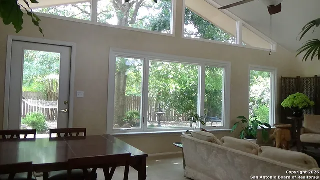 a living room with furniture and window