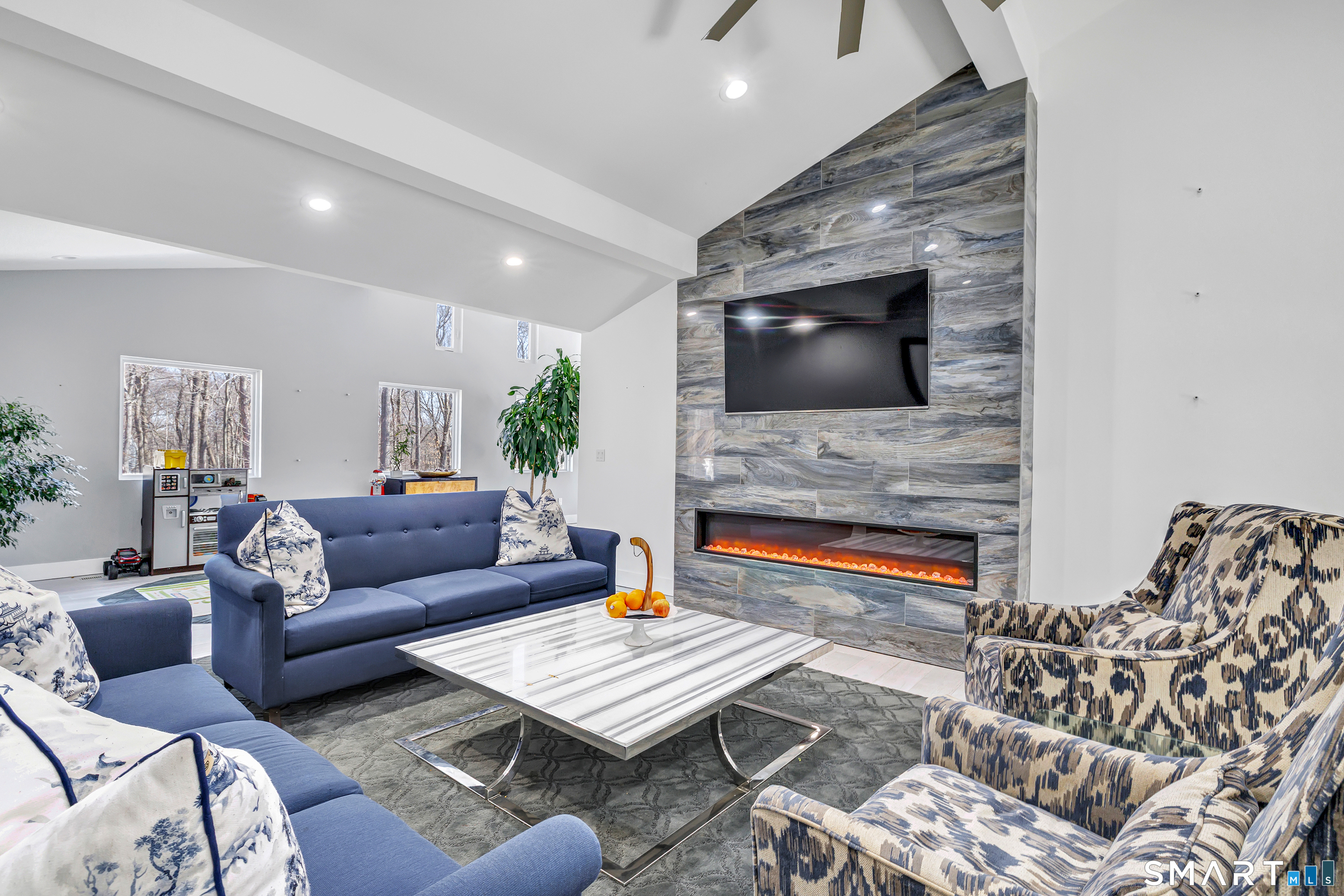 27 Old Quarry Road Woodbridge, CT 06525 - Photo 3 of 40 Living Room with tiled fireplace
