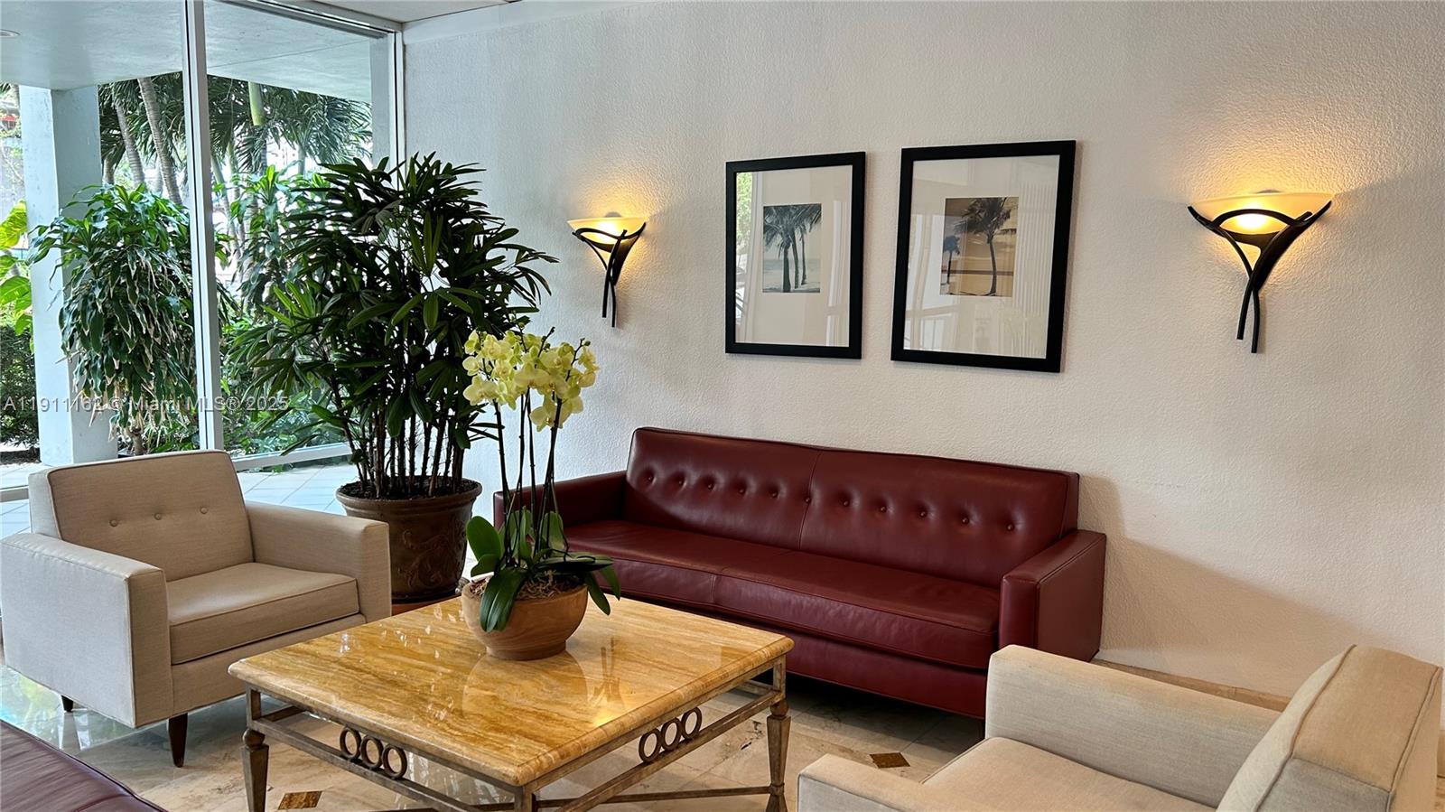 150 Southeast 25th Road, Unit 4C Miami, FL 33129 - Photo 20 of 23 a living room with furniture plant and a potted plant