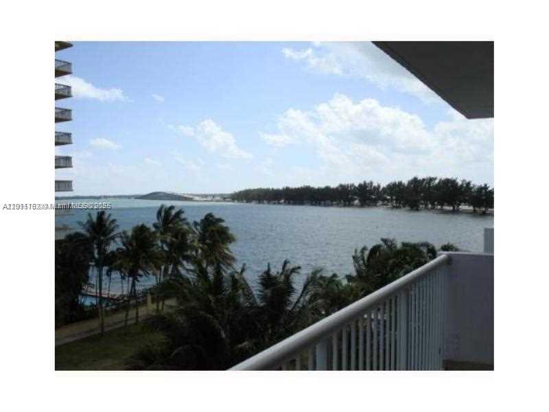 150 Southeast 25th Road, Unit 4C Miami, FL 33129 - Photo 7 of 23 a view of a lake from a balcony