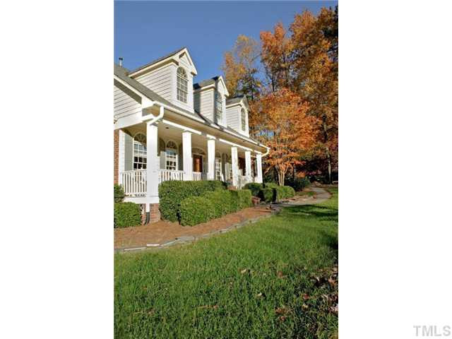 5801 Orchid Valley Road Raleigh, NC 27613 - Photo 22 of 25 The rocking chair front porch is perfect for greeting the passing neighbors in this friendly neighborhood. Yard