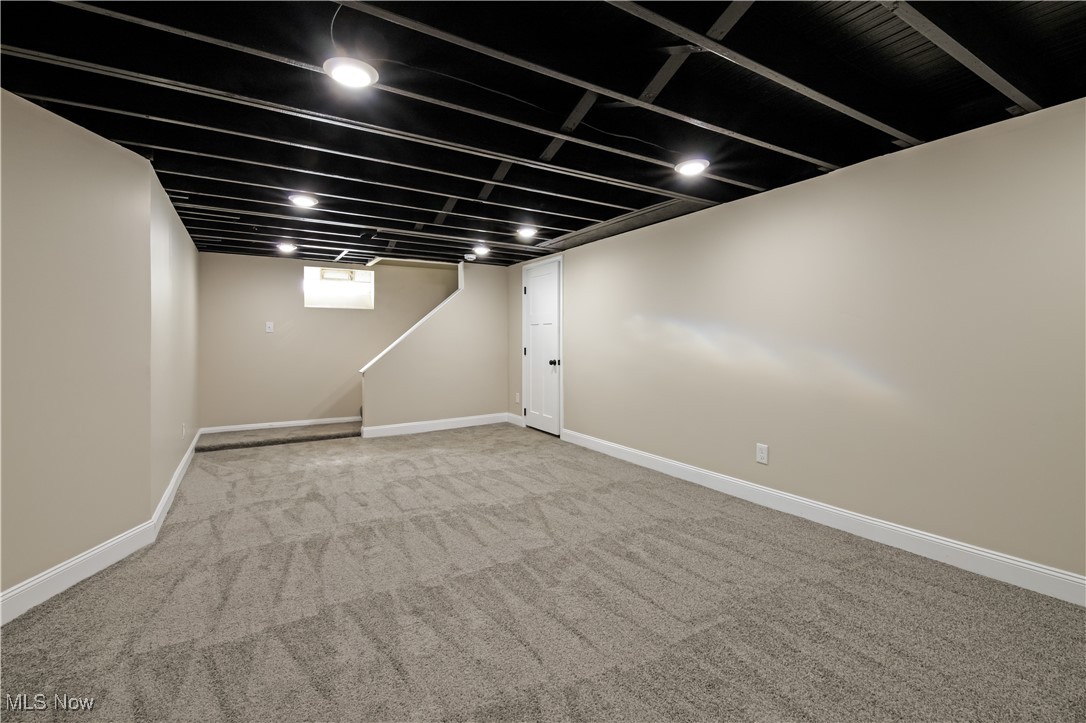 3716 Rolliston Road Cleveland, OH 44120 - Photo 33 of 37 Below grade area featuring carpet flooring and baseboards