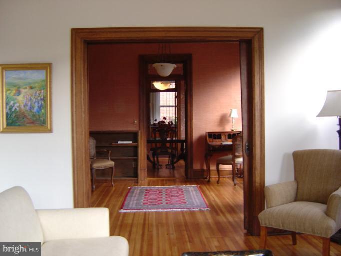 258 8th Street Southeast Washington, DC 20003 - Photo 12 of 30 a living room with furniture and wooden floor