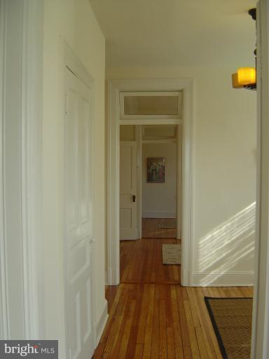 258 8th Street Southeast Washington, DC 20003 - Photo 20 of 30 a view of a bathroom from a hallway