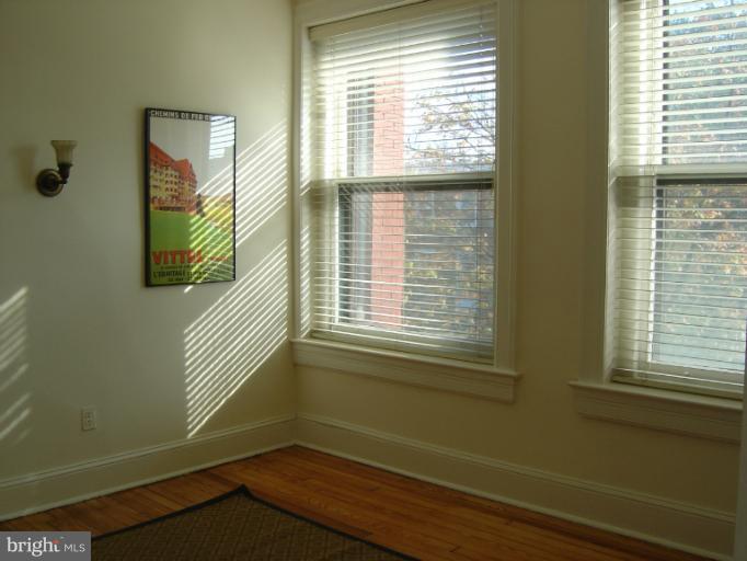 258 8th Street Southeast Washington, DC 20003 - Photo 21 of 30 a view of an empty room with a window and a dresser