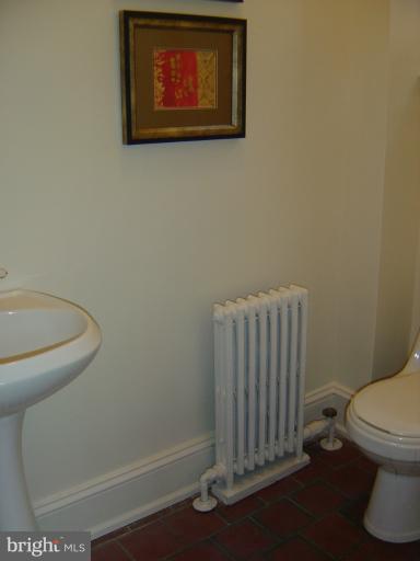 258 8th Street Southeast Washington, DC 20003 - Photo 10 of 30 a bathroom with a toilet and a shower
