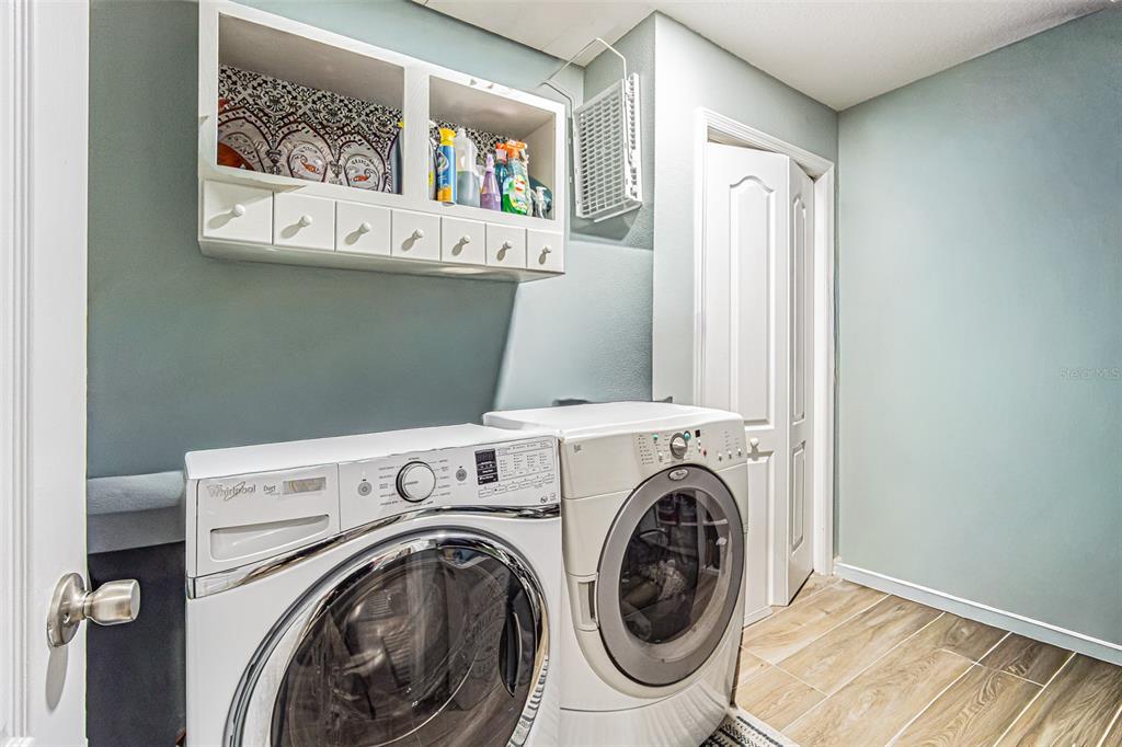 9809 La Rita Place Riverview, FL 33569 - Photo 27 of 59 a utility room with dryer and washer