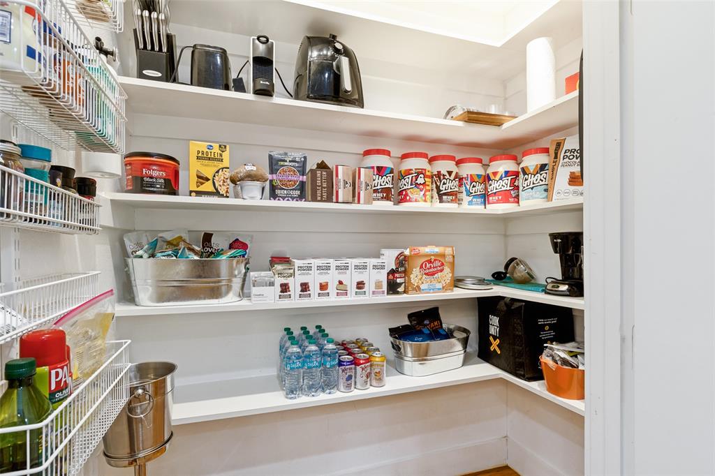 4618 Cedar Springs Road, Unit B Dallas, TX 75219 - Photo 15 of 24 a store room with lots of different kinds of food