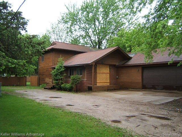 2959 Potter Road Wixom, MI 48393 - Photo 1 of 17 front