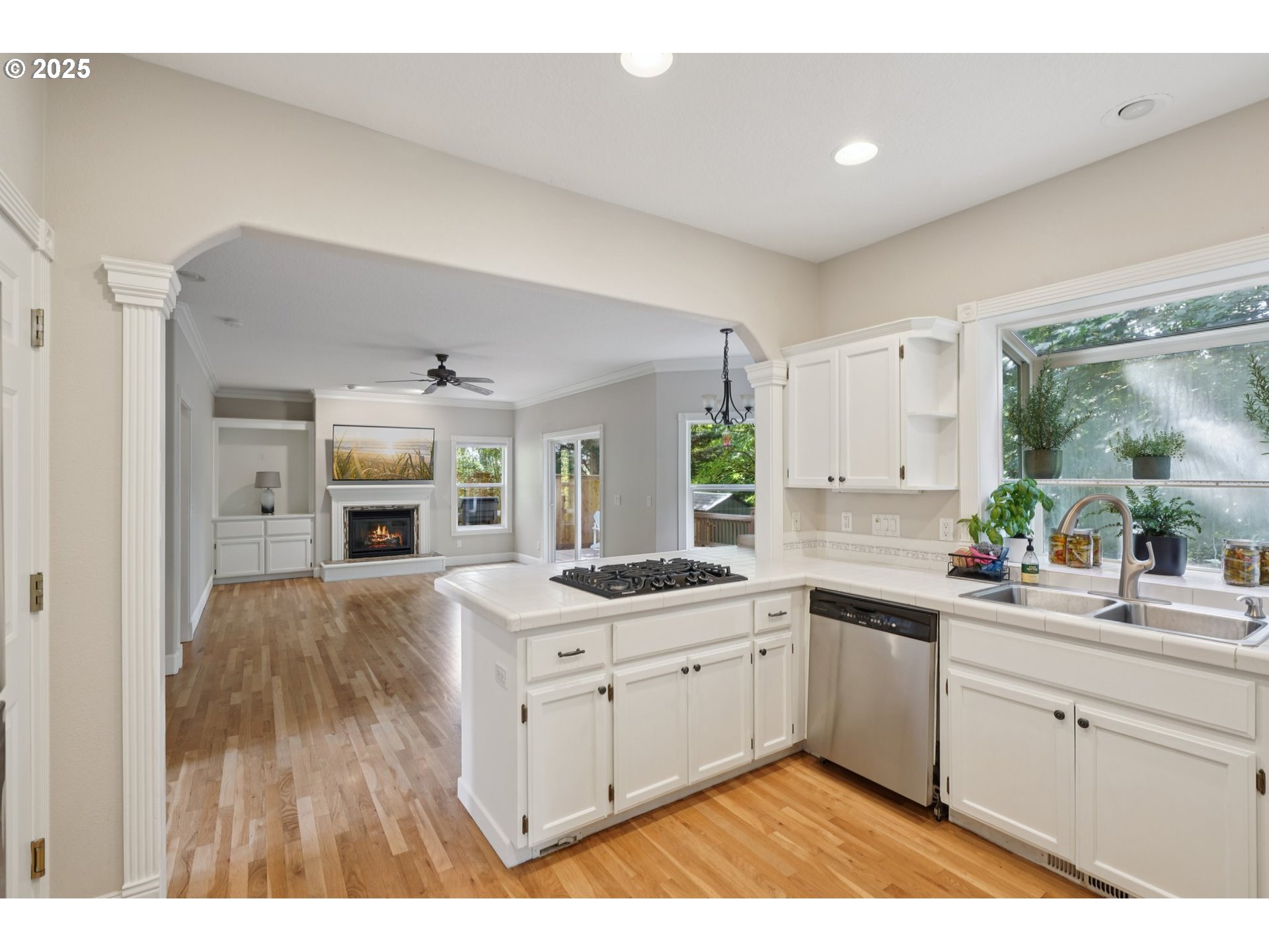 2144 Northwest 22nd Avenue Camas, WA 98607 - Photo 12 of 40 a kitchen with sink a stove and cabinets