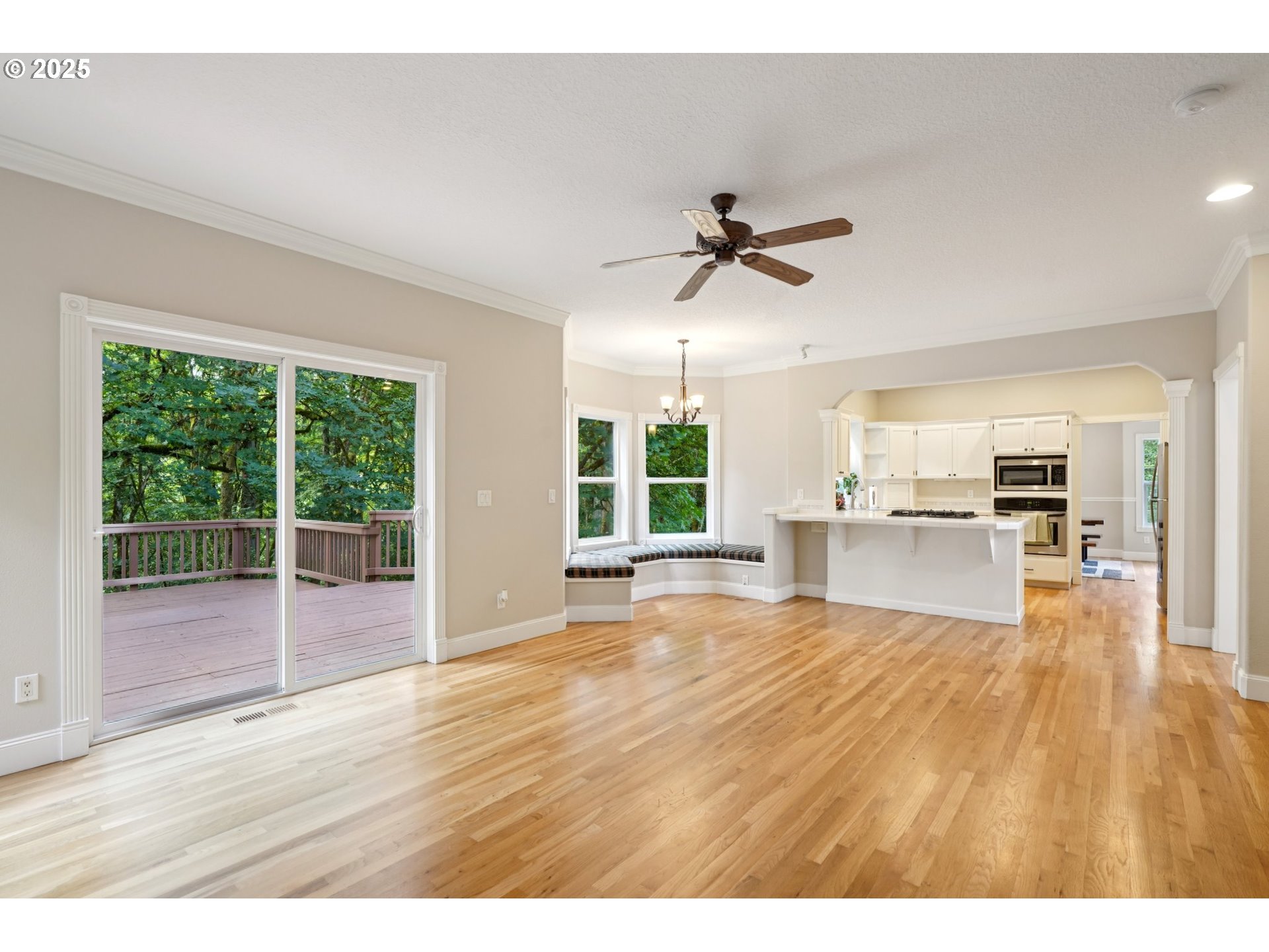 2144 Northwest 22nd Avenue Camas, WA 98607 - Photo 13 of 40 a view of empty room with wooden floor and fan