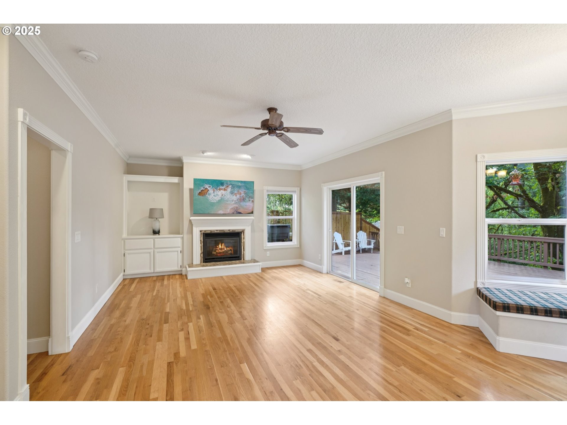 2144 Northwest 22nd Avenue Camas, WA 98607 - Photo 14 of 40 a view of an empty room with wooden floor and a window