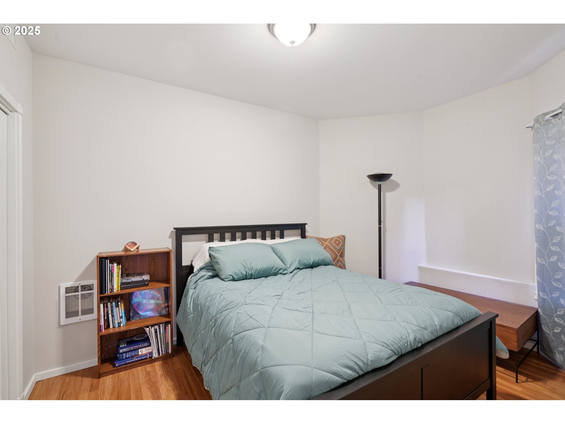 2144 Northwest 22nd Avenue Camas, WA 98607 - Photo 29 of 40 a bedroom with a bed and a book shelf