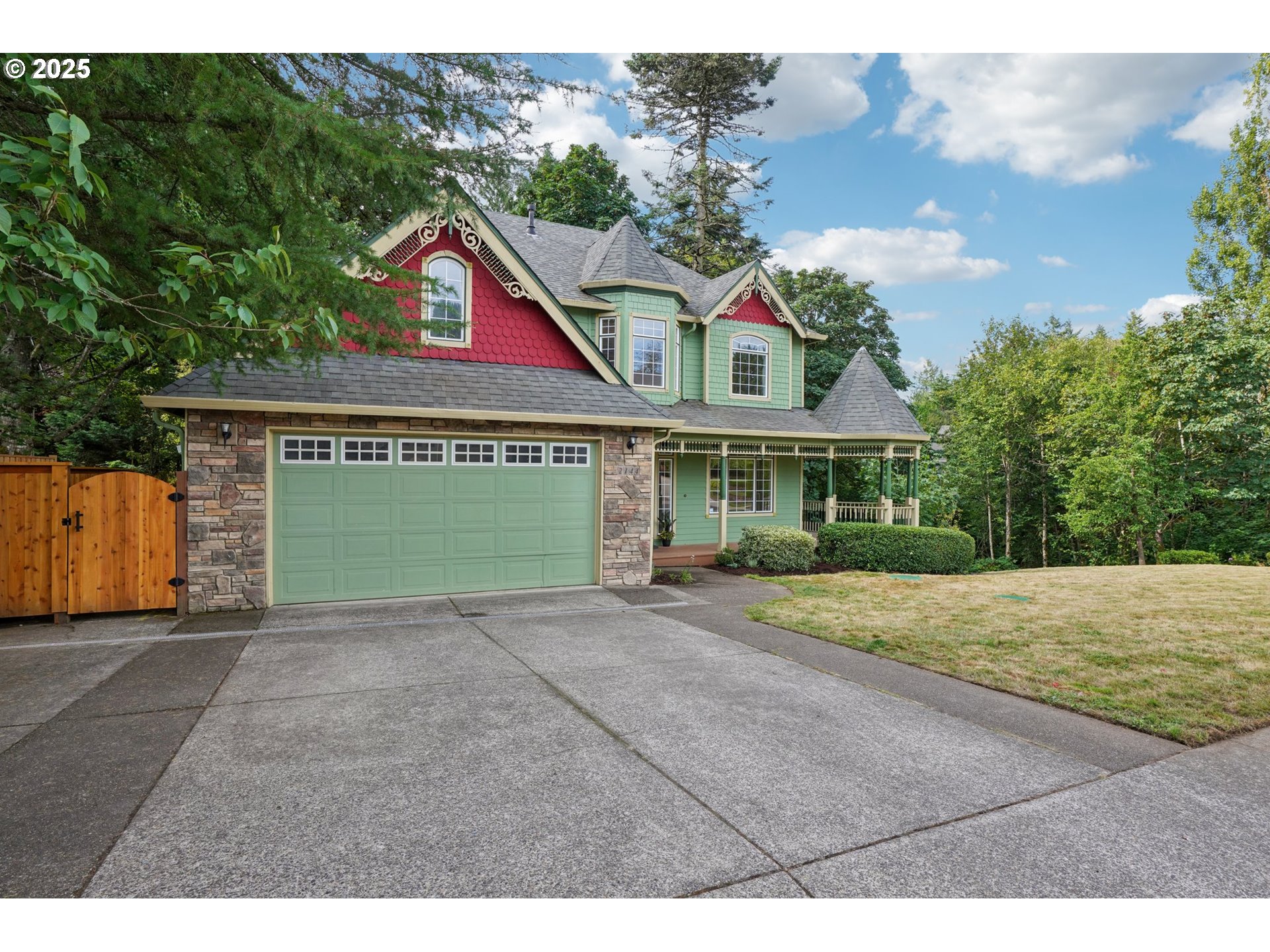 2144 Northwest 22nd Avenue Camas, WA 98607 - Photo 4 of 40 a view of a house with a yard and garage