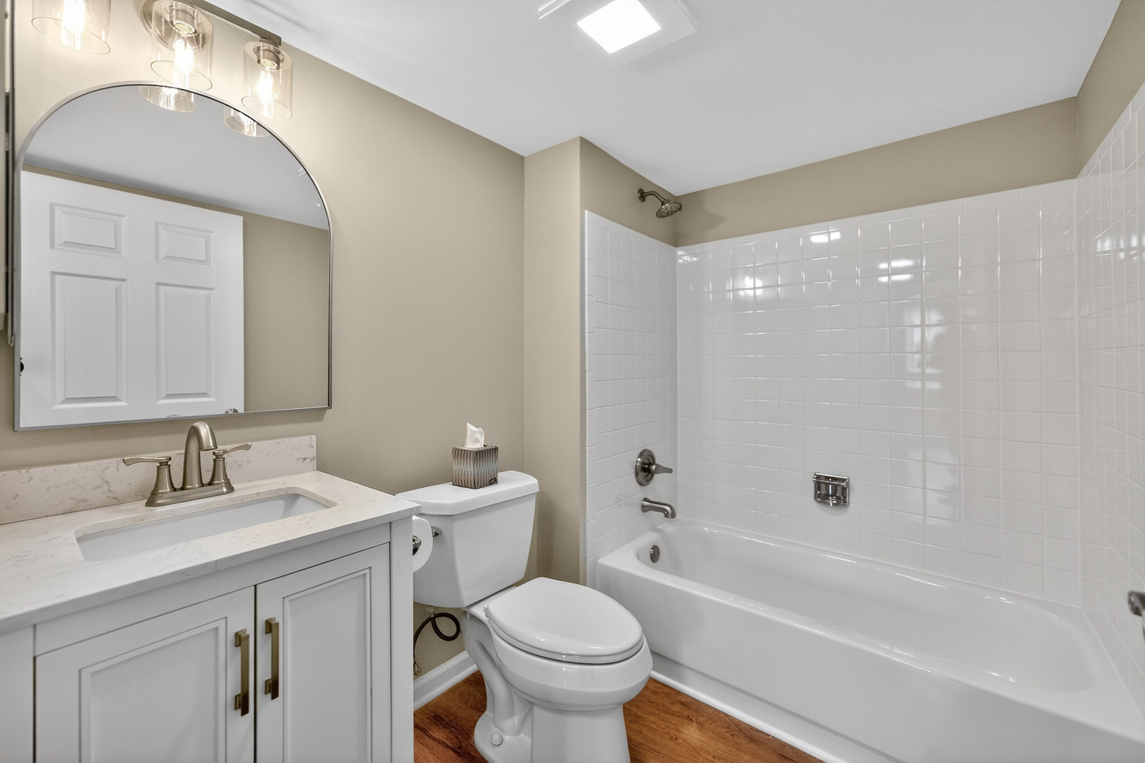 446 Cromwell Circle, Unit 4 Bartlett, IL 60103 - Photo 15 of 18 a bathroom with a sink toilet tub and shower