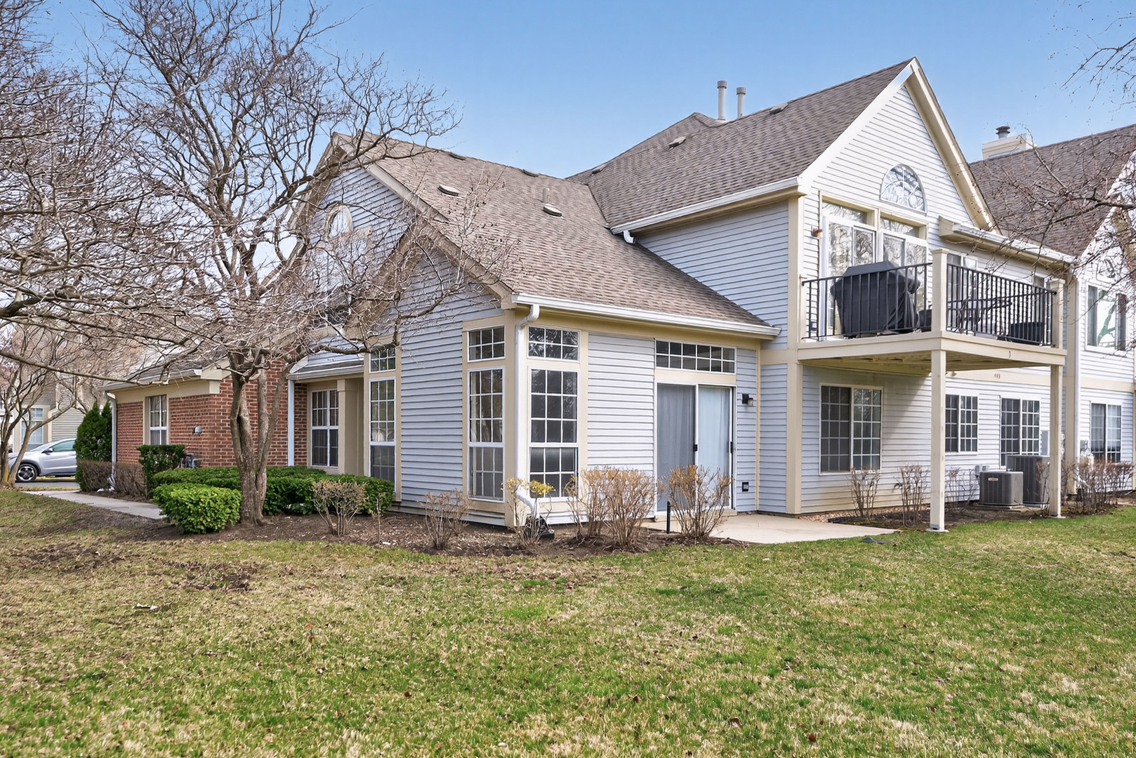 446 Cromwell Circle, Unit 4 Bartlett, IL 60103 - Photo 18 of 18 front view of a house with a yard