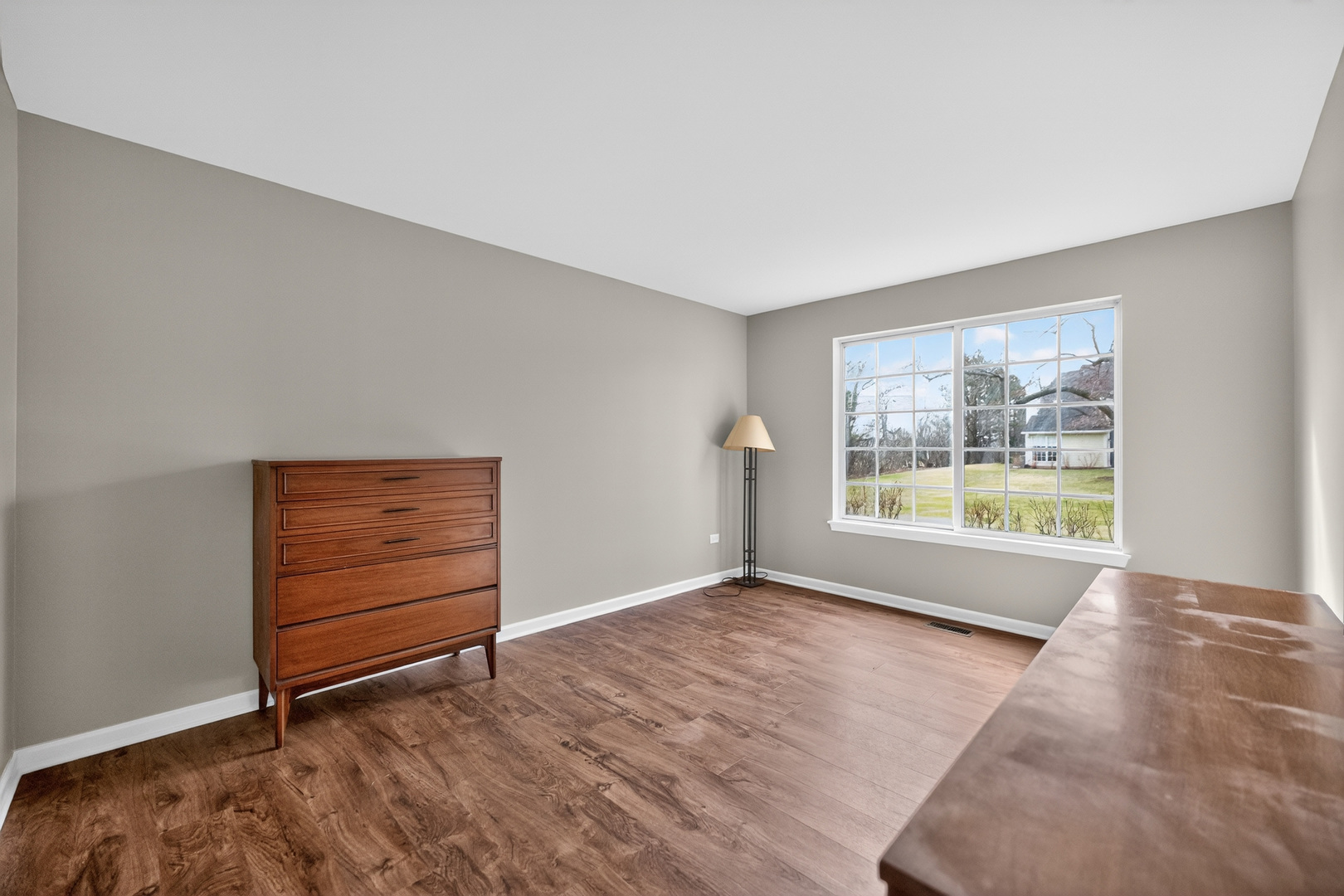 446 Cromwell Circle, Unit 4 Bartlett, IL 60103 - Photo 10 of 18 a view of an empty room with a window