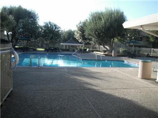 255 South Rengstorff Avenue, Unit 94 Mountain View, CA 94040 - Photo 11 of 12 a view of a street with houses