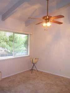 255 South Rengstorff Avenue, Unit 94 Mountain View, CA 94040 - Photo 3 of 12 a view of an empty room with a window
