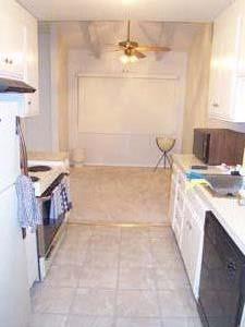 255 South Rengstorff Avenue, Unit 94 Mountain View, CA 94040 - Photo 5 of 12 a bathroom with a tub sink and a mirror